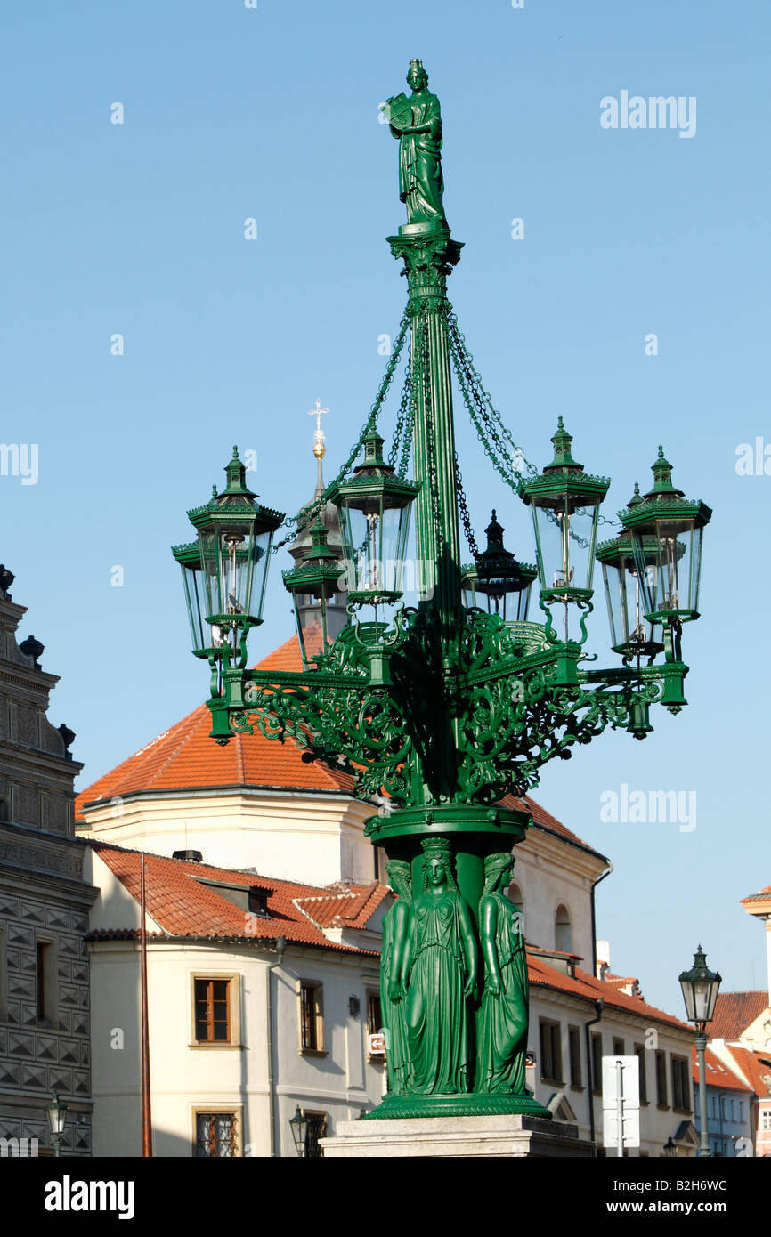 The lamp post in the center of the Hradcany Square in Prague with the Schwarzenberg Palace in the background Stock Photo