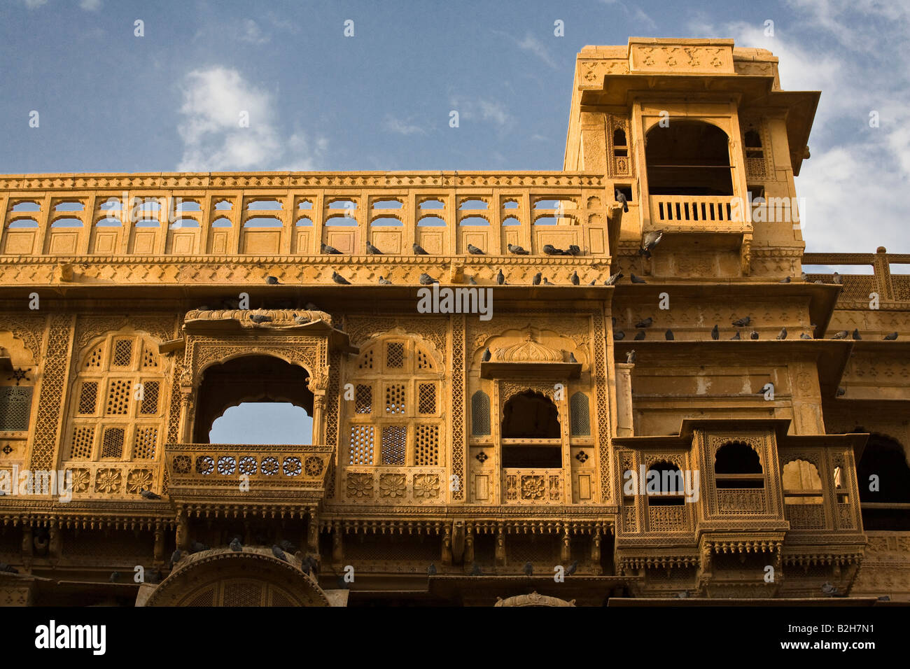 The Patwa Ki Haveli is the finest example of sandstone construction in the GOLDEN CITY of JAISALMER RAJASTHAN INDIA Stock Photo