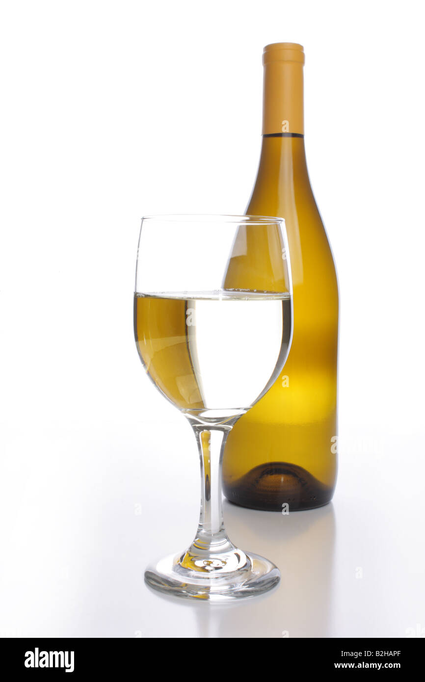 White wine bottle with a crystal glass Stock Photo Alamy