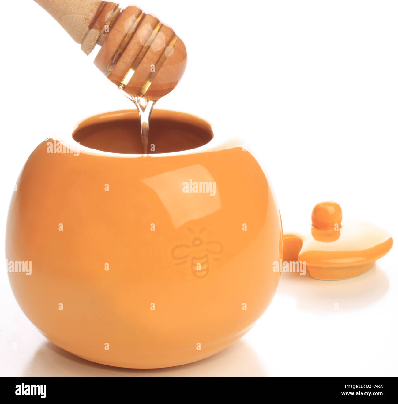 Honey jar wood dipper isolated hires stock photography and images Alamy