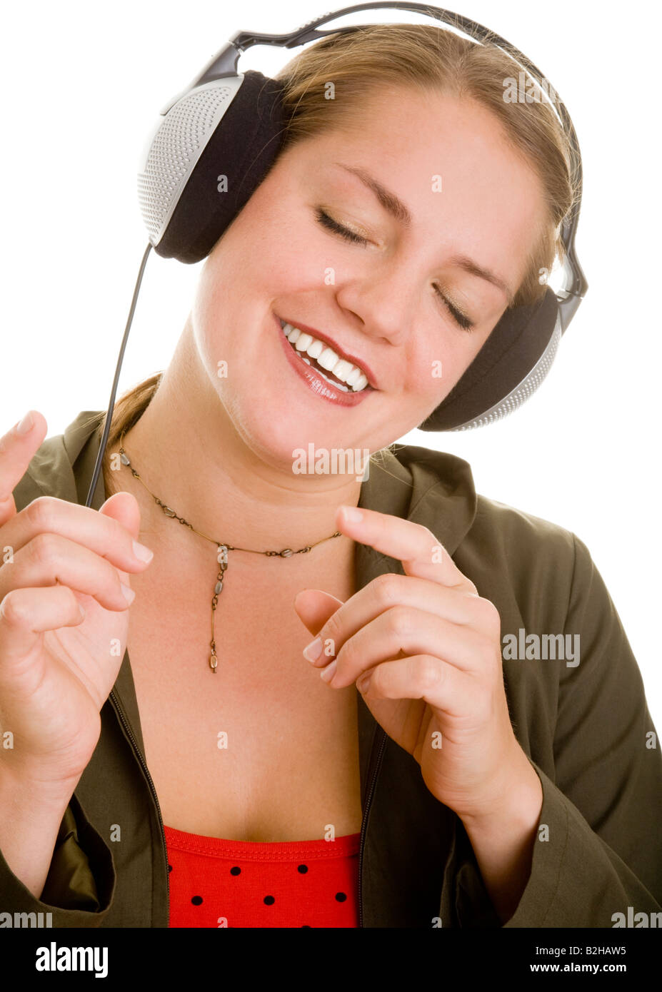 delighted woman headphone music hearing hi fi audio pop music musical dj diskjockey entertainment Stock Photo