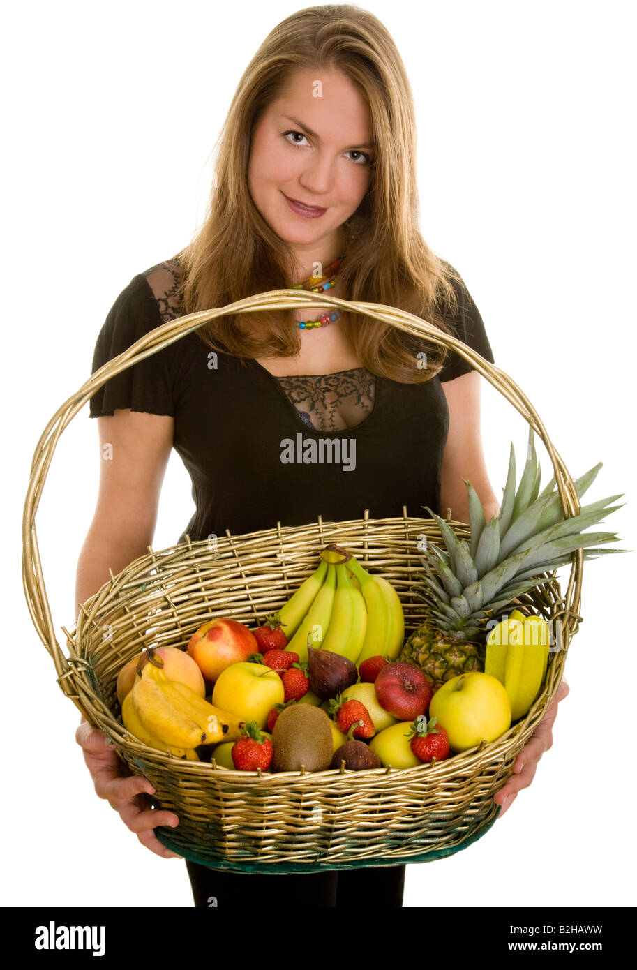 fruit basket fruits healthfull sound food feeding woman Stock Photo