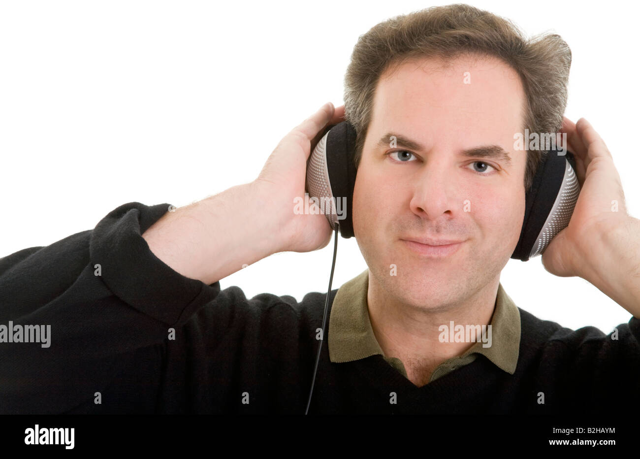 man headphone music concentrative hearing hi fi audio pop music musical dj diskjockey entertainment Stock Photo