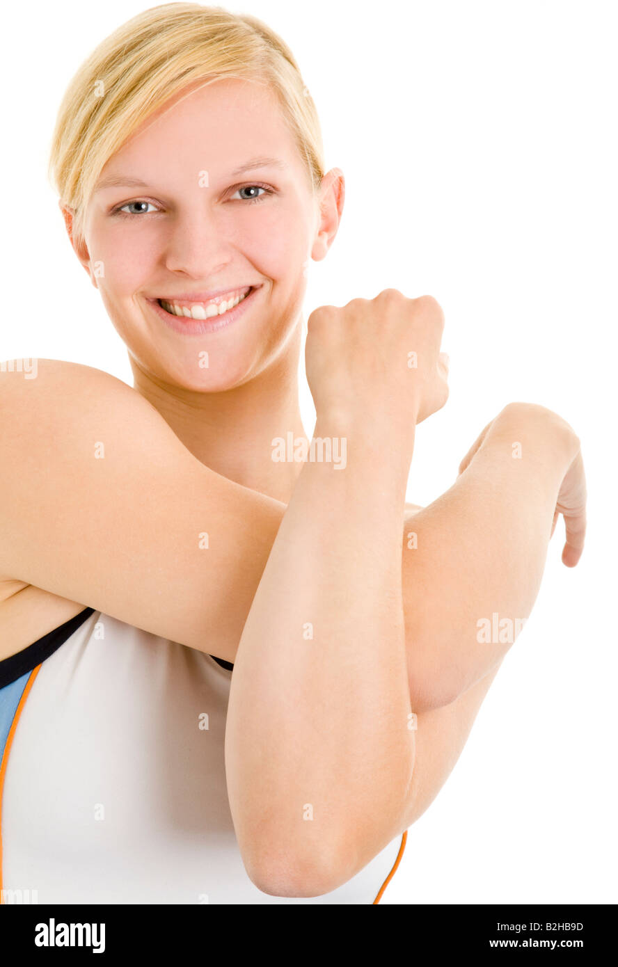 young blond attractive woman sports wear gymnastic woman young flexible dun sporty sporting dynamic active back wellness fitness Stock Photo
