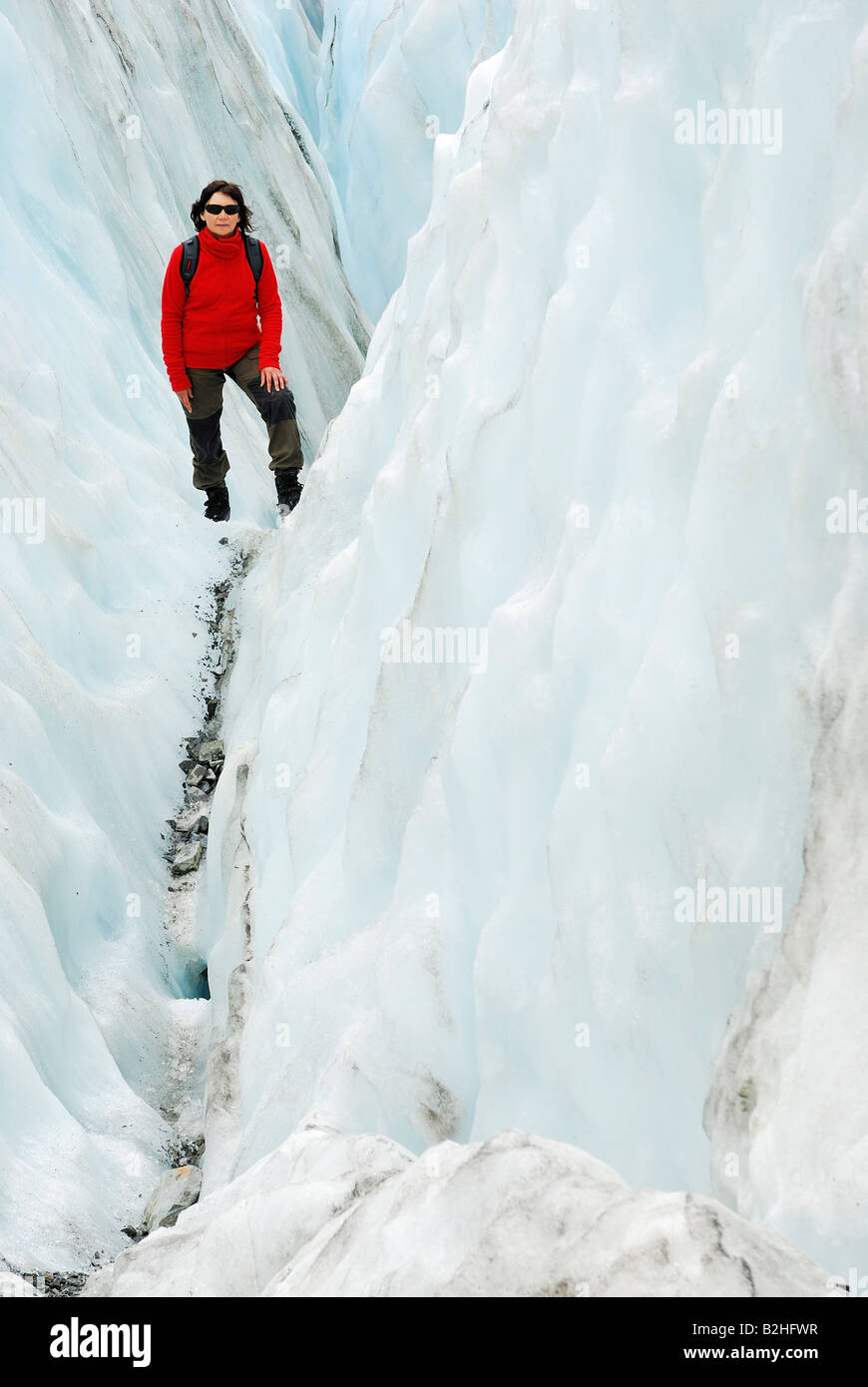 ice wandering wanderer crevasse ice crevice Franz Josef  Glacier Westland NP National park South West New Zealand ice landscape Stock Photo
