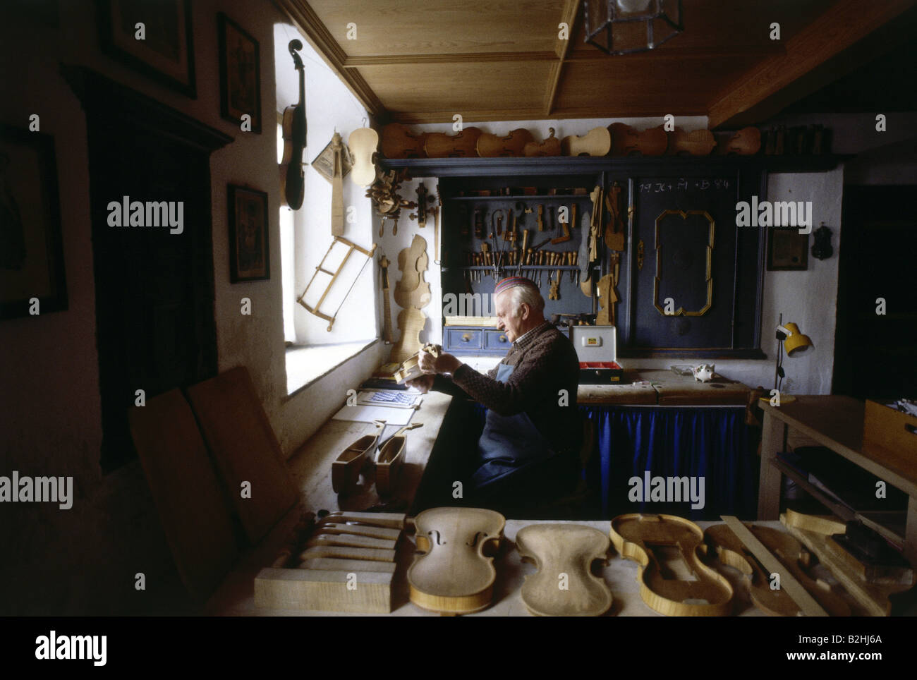 people, profession, violin maker, studio of Josef Kantuscher, Mittenwald, Bavaria, luthier, handcraft, craft, arts and crafts, i Stock Photo
