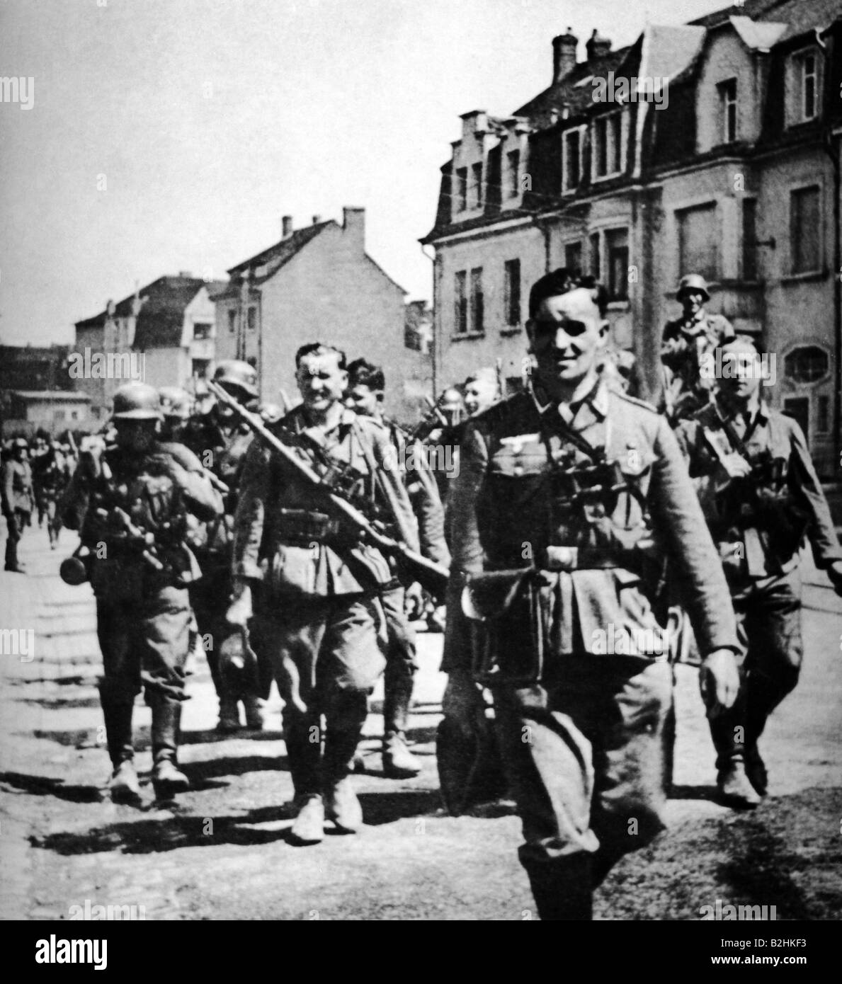 events, Second World War / WWII, Belgium, Battle of France, German infantry passing through a village, May 1940, Stock Photo