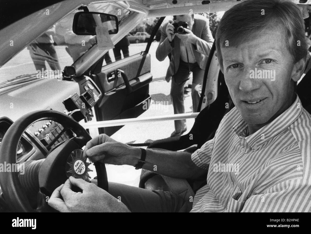 Röhrl, Walter, * 7.3.1947, German athlete (race driver), sitting in car, 1988, Stock Photo