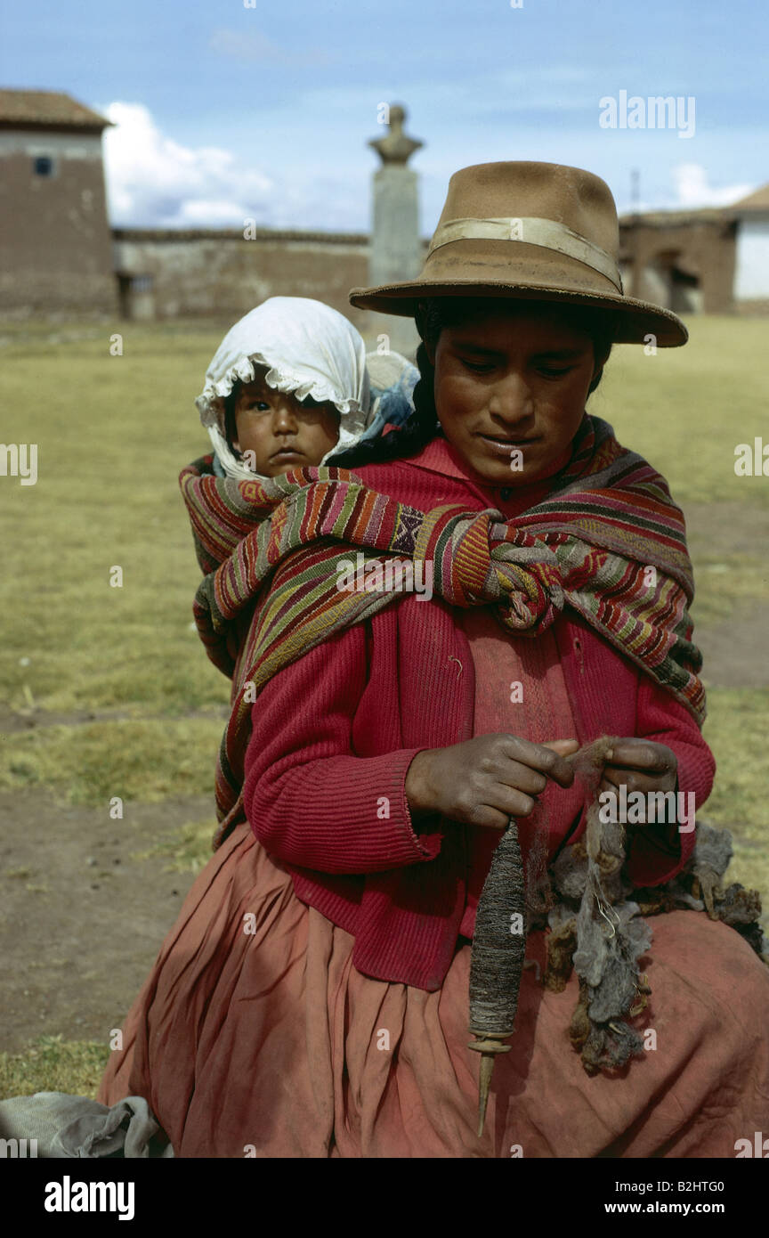 people, women with children, indigenous woman with child on back, Chinchero, Peru, mother, baby-sling, carry-sling, baby, infant Stock Photo