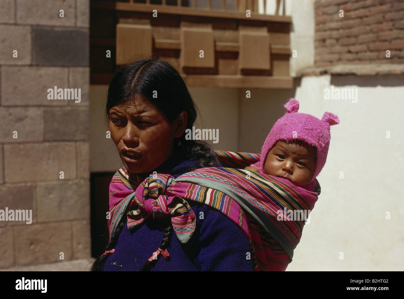 people, women with children, Peru, indigenous woman with infant, baby-sling, Cusco, mother, handcraft, ethnic, ethnology, carry- Stock Photo