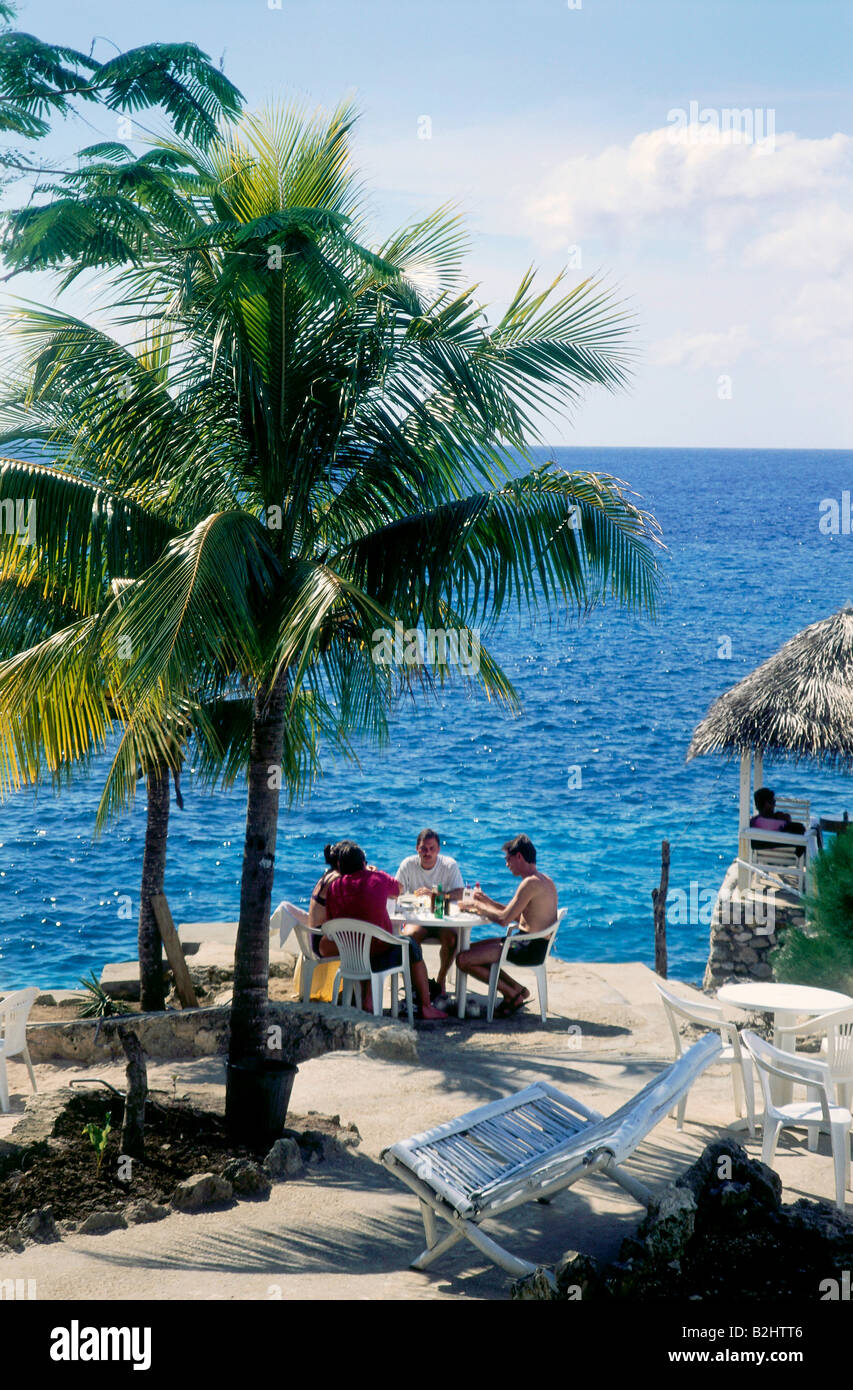 geography / travel, Jamaica, tourism, terrace under palm trees with sea