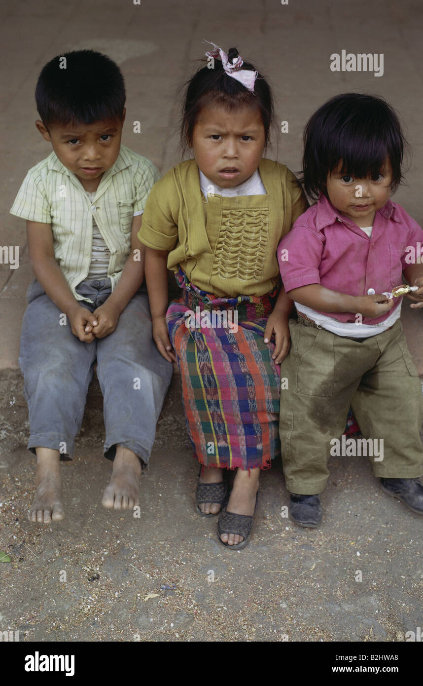 people, children, Mexico, three children, ethnic, ethnology, Central America, poverty, bare-footed, shoeless, wet pants, wetted, Stock Photo