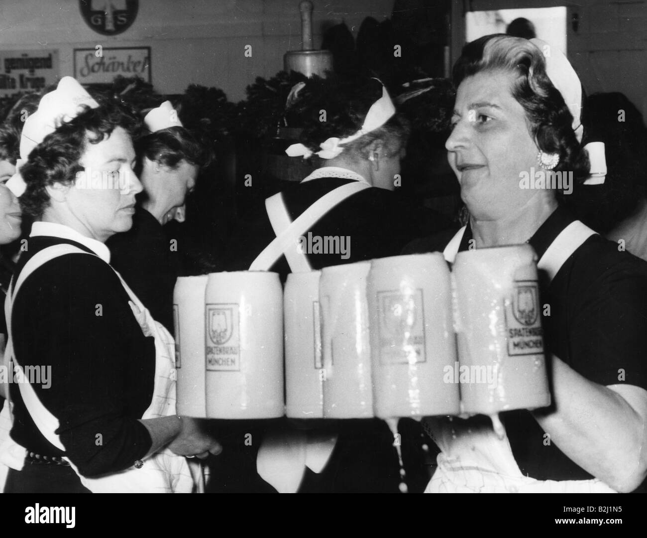 geography / travel, Germany, Munich, Oktoberfest, waitress with beer mugs, 1950s, , Stock Photo