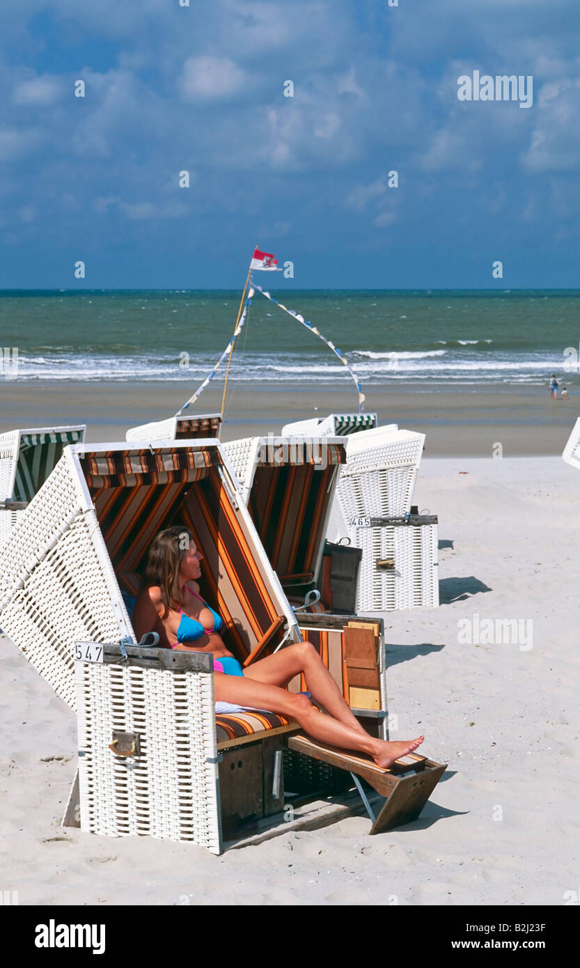beach chair bathing beauty woman Wangerooge lower east frisian Sanony Germany Stock Photo