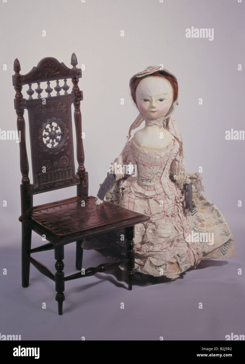 toys, dolls, wood doll, carved, painted, clothes, wooden chair, carved