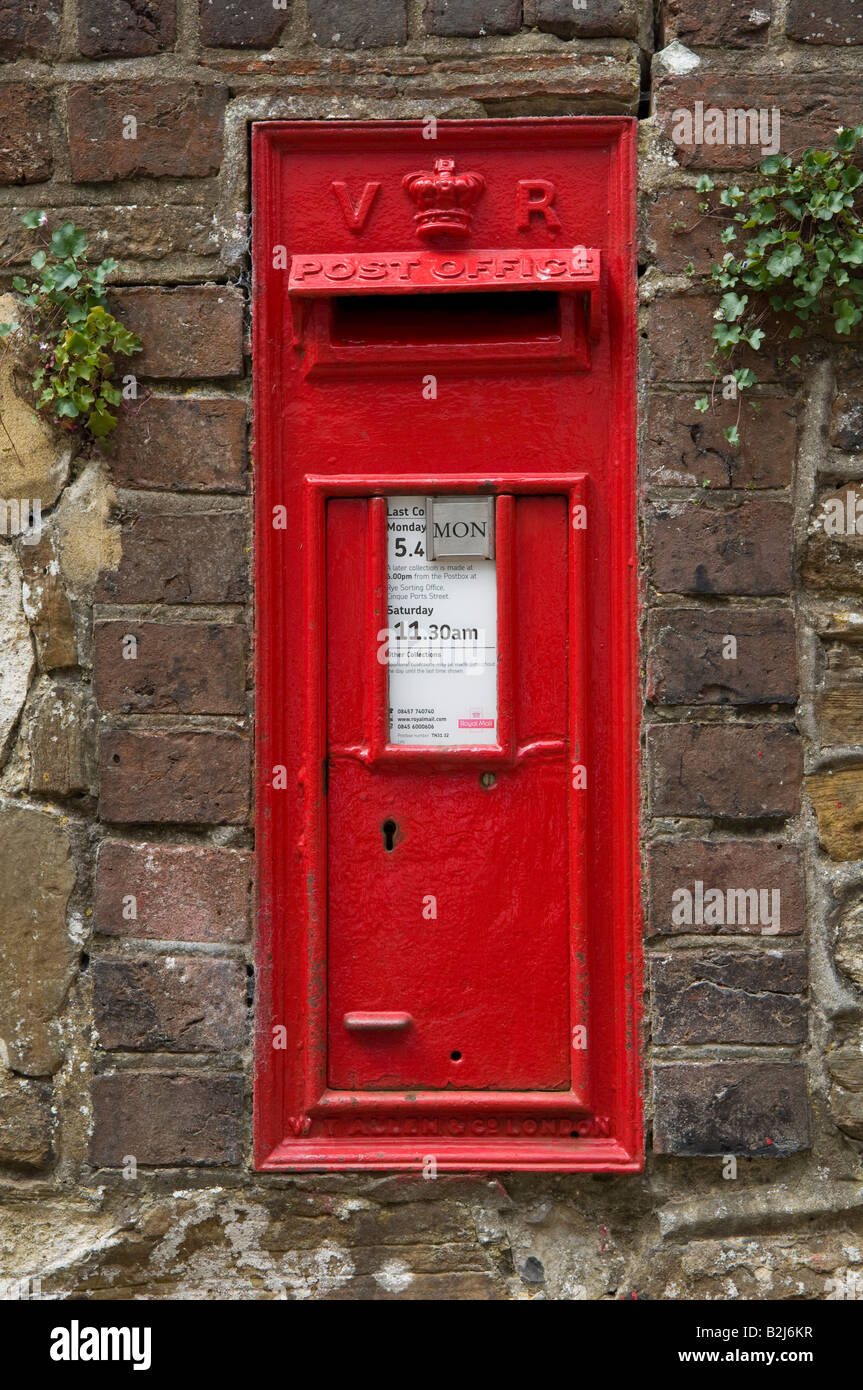 Old style postbox built into wall in Rye in East Sussex Stock Photo