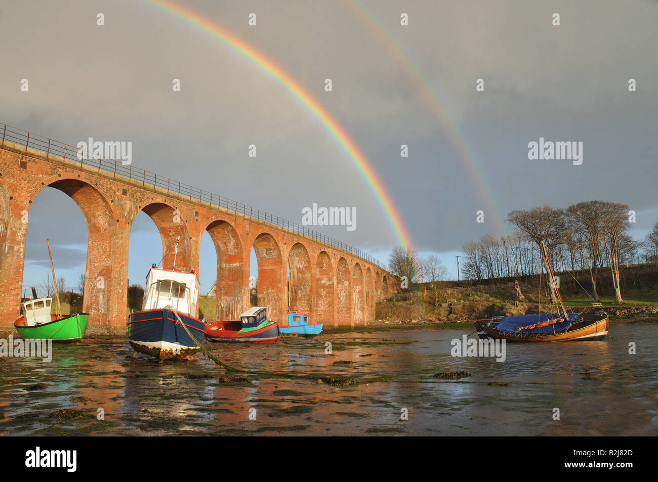 Rainbow over viaduct in Montrose, Angus, Tayside, Scotland. Stock Photo
