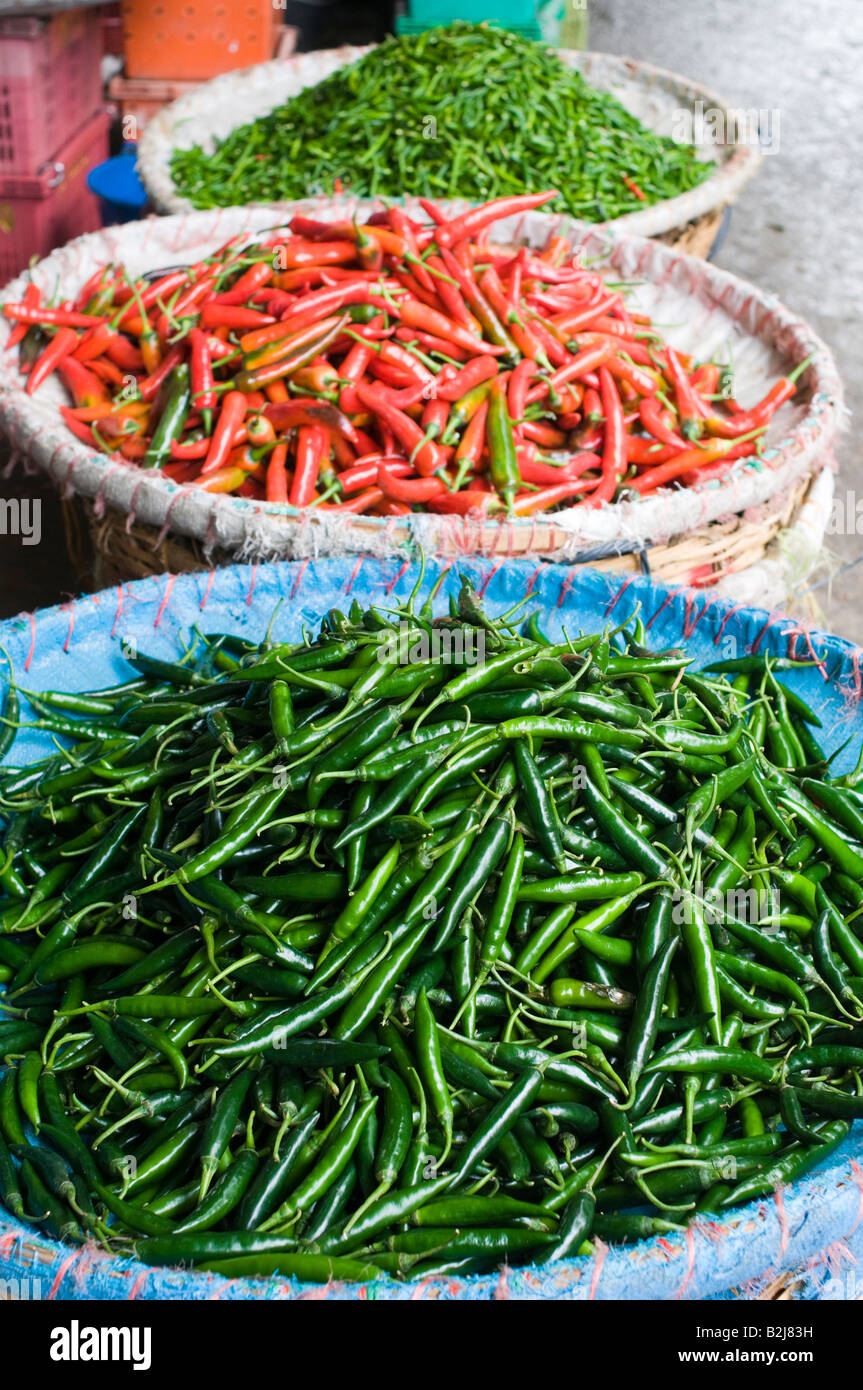Green and red chilli peppers in a Bangkok Market, Thailand Stock Photo ...