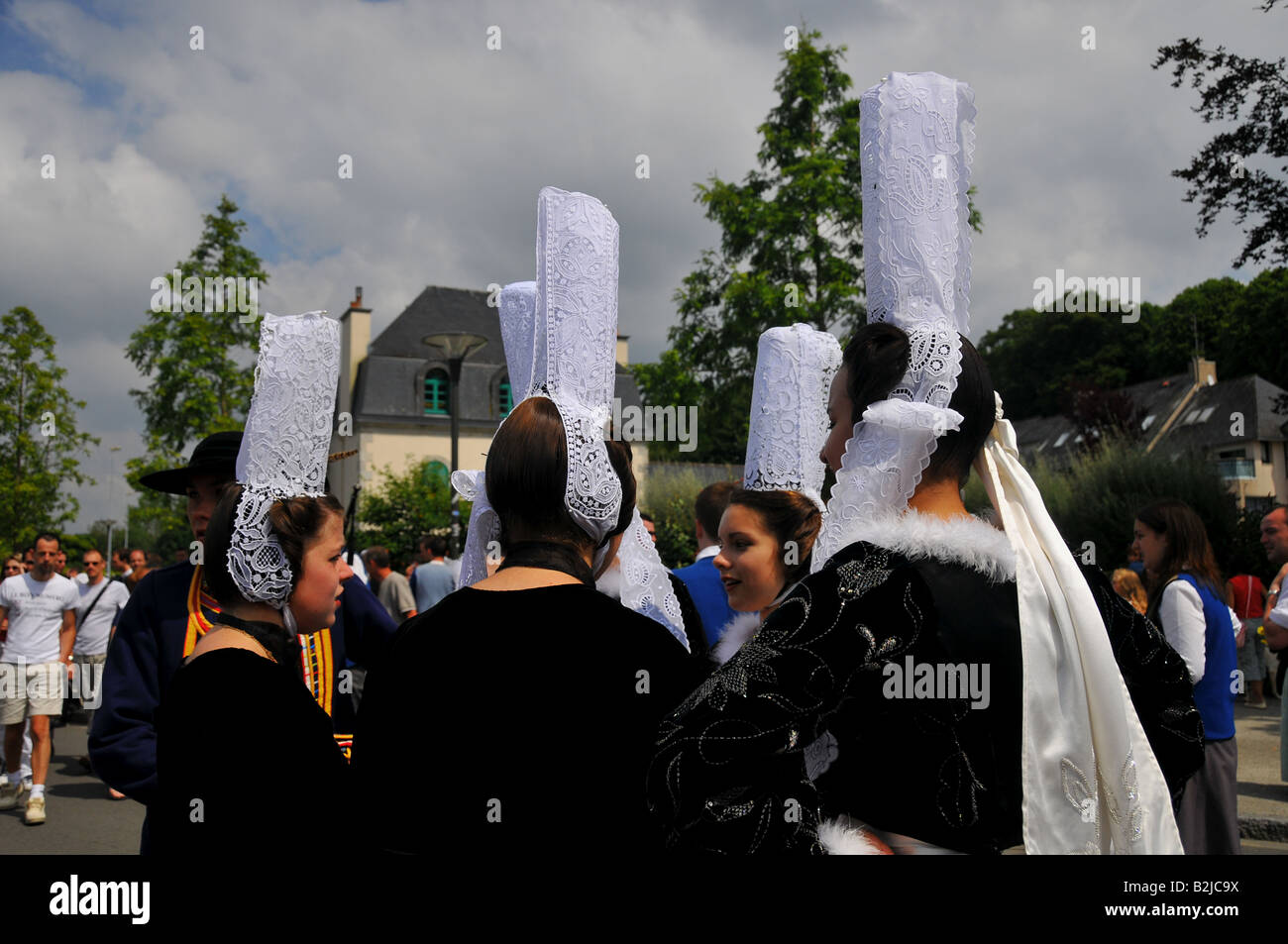 bigouden headgears weared during the Cornwall Festival in Quimper 2008 Brittany by young women Stock Photo