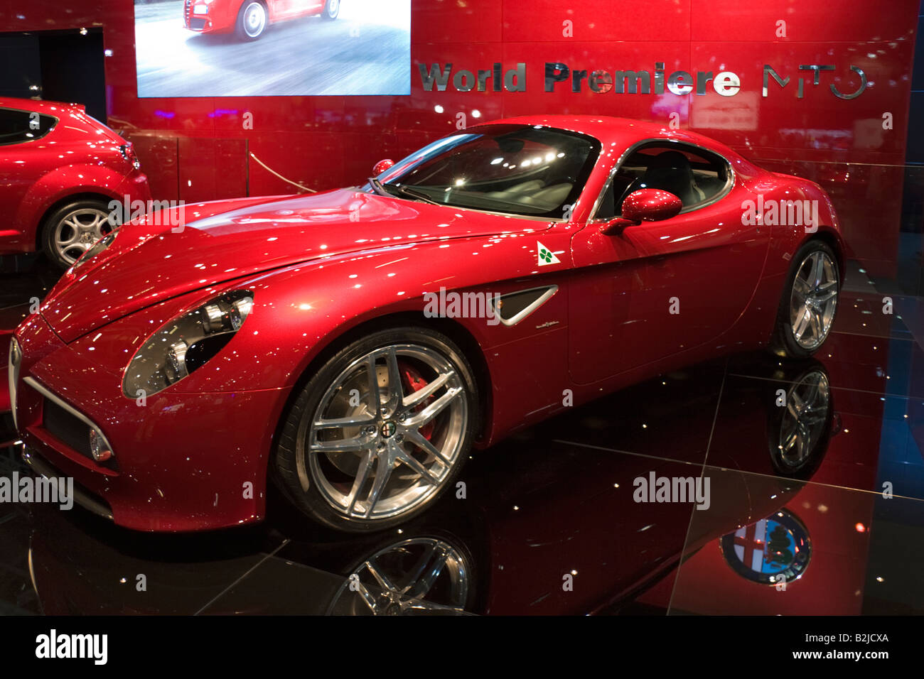 A bright red Alpha Romeo 8C Competizione supercar on display at the British Motor Show at ExCel in July 2008 Stock Photo