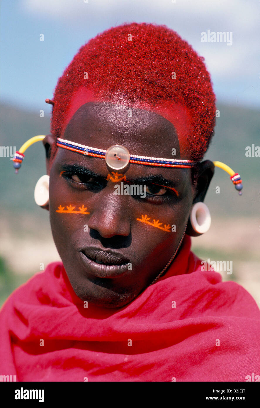 Samburu man in traditional make up and costume, Kenya Stock Photo
