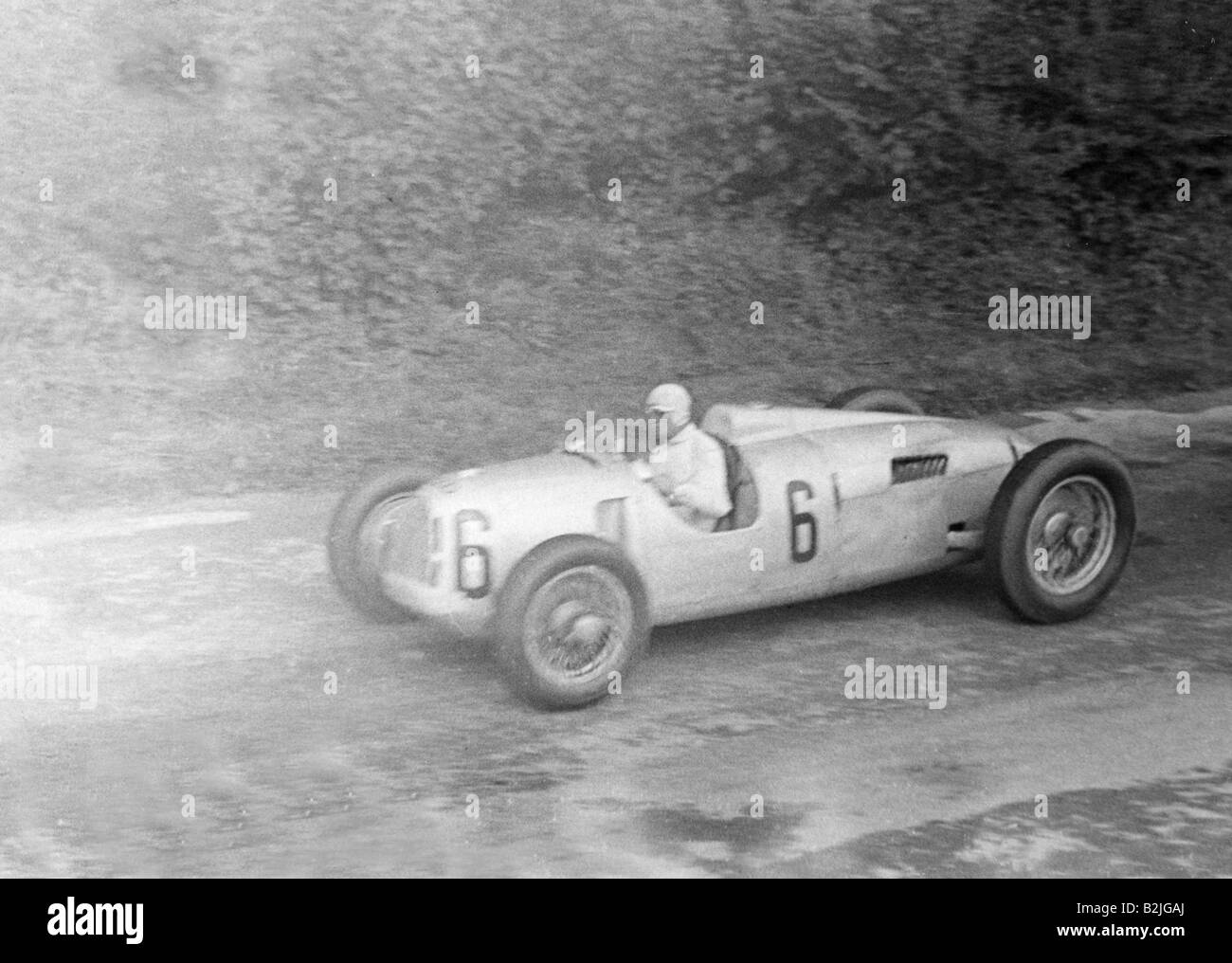 Nuvolari, Tazio Giorgio, 16.11.1892 - 11.8.1953, Italian racecar driver, half length, driving racing car Type C of Auto Union AG, 1930s, Stock Photo