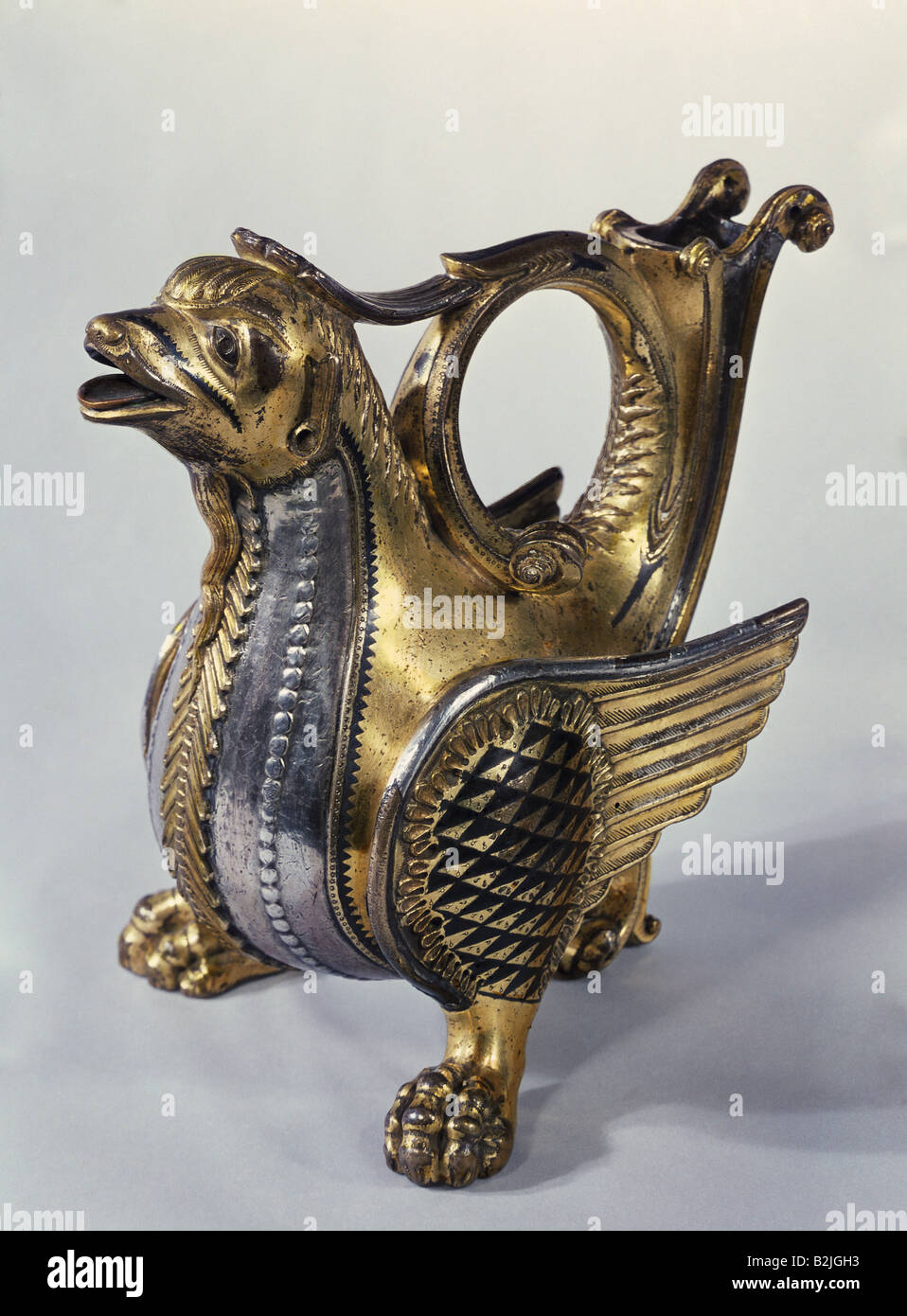 fine arts, Middle Ages, Germany, aquamanile, griffin, cast bronze, chased, silvered, Moselle area, mid 12th century, Victoria and Albert Museum, London, Artist's Copyright has not to be cleared Stock Photo