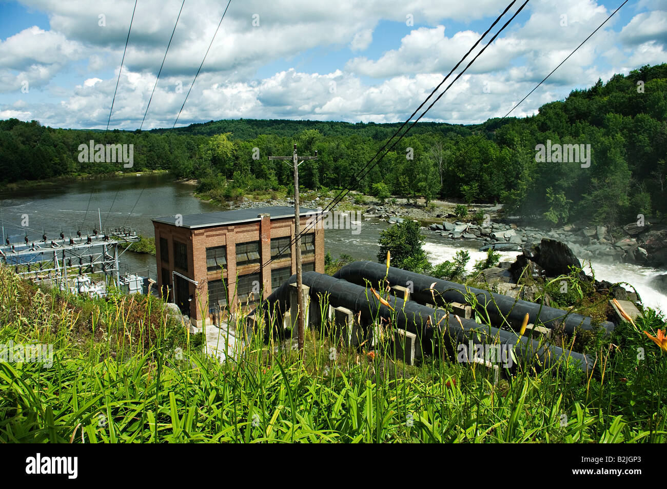 Small hydro electric power generation plant on the LaMoille River at Fairfax VT US Stock Photo