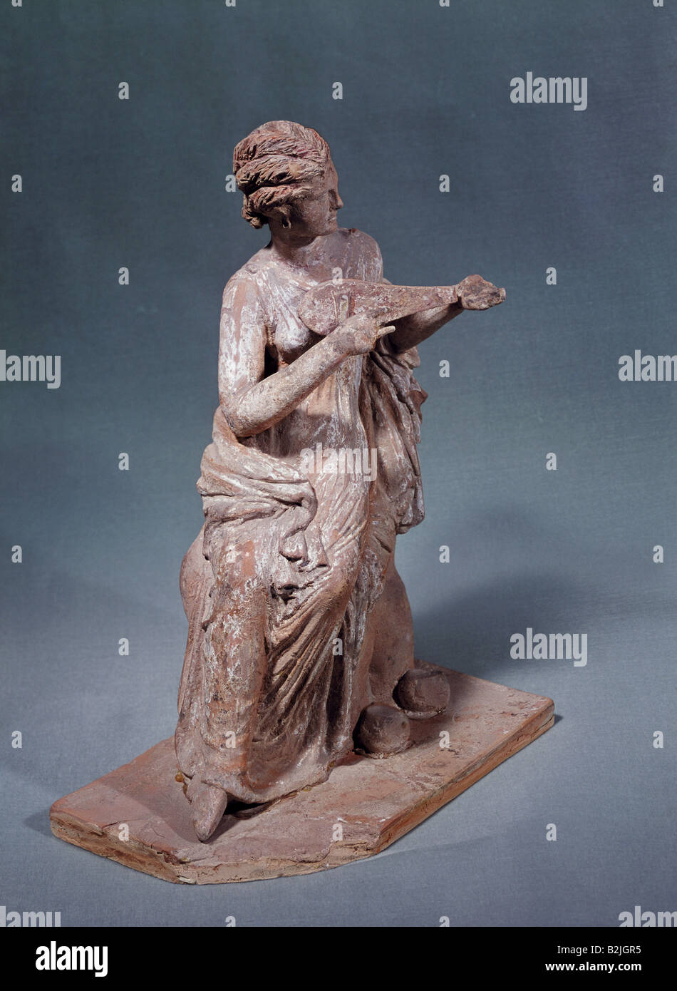 fine arts, ancient world, Greece, girl with lute, terra cotta, Tanagra, 3rd century B.C., Louvre, Paris, Artist's Copyright has not to be cleared Stock Photo