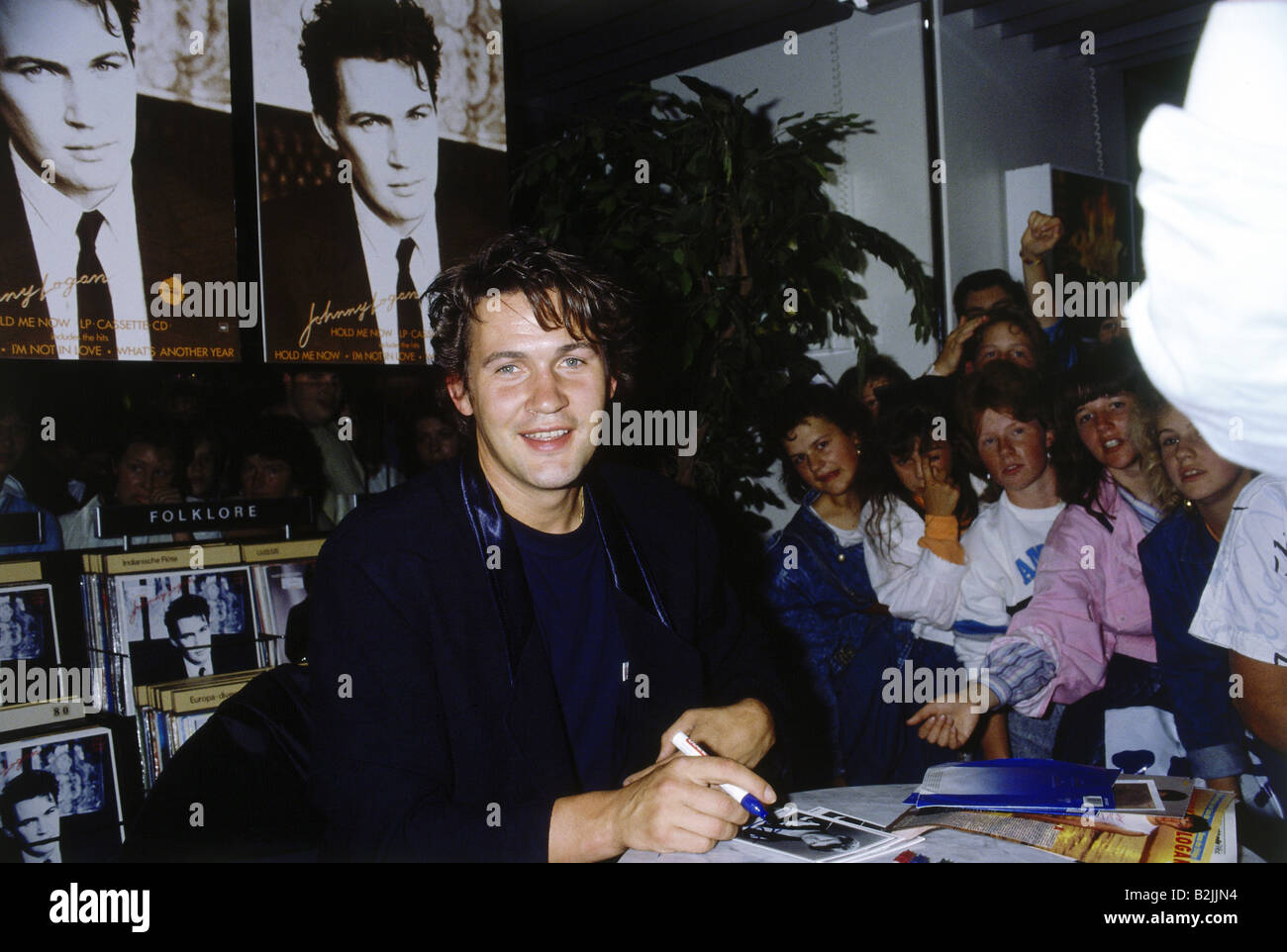 Logan Johnny, * 13.5.1954, Irish singer and composer, half length, autographing session, shopping centre Karstadt Oberpollinger, Munich, 1987, Stock Photo