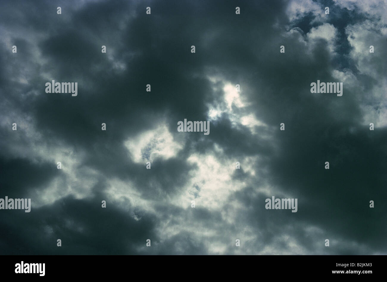 Stormy grey sky with heavy nimbostratus clouds. Stock Photo