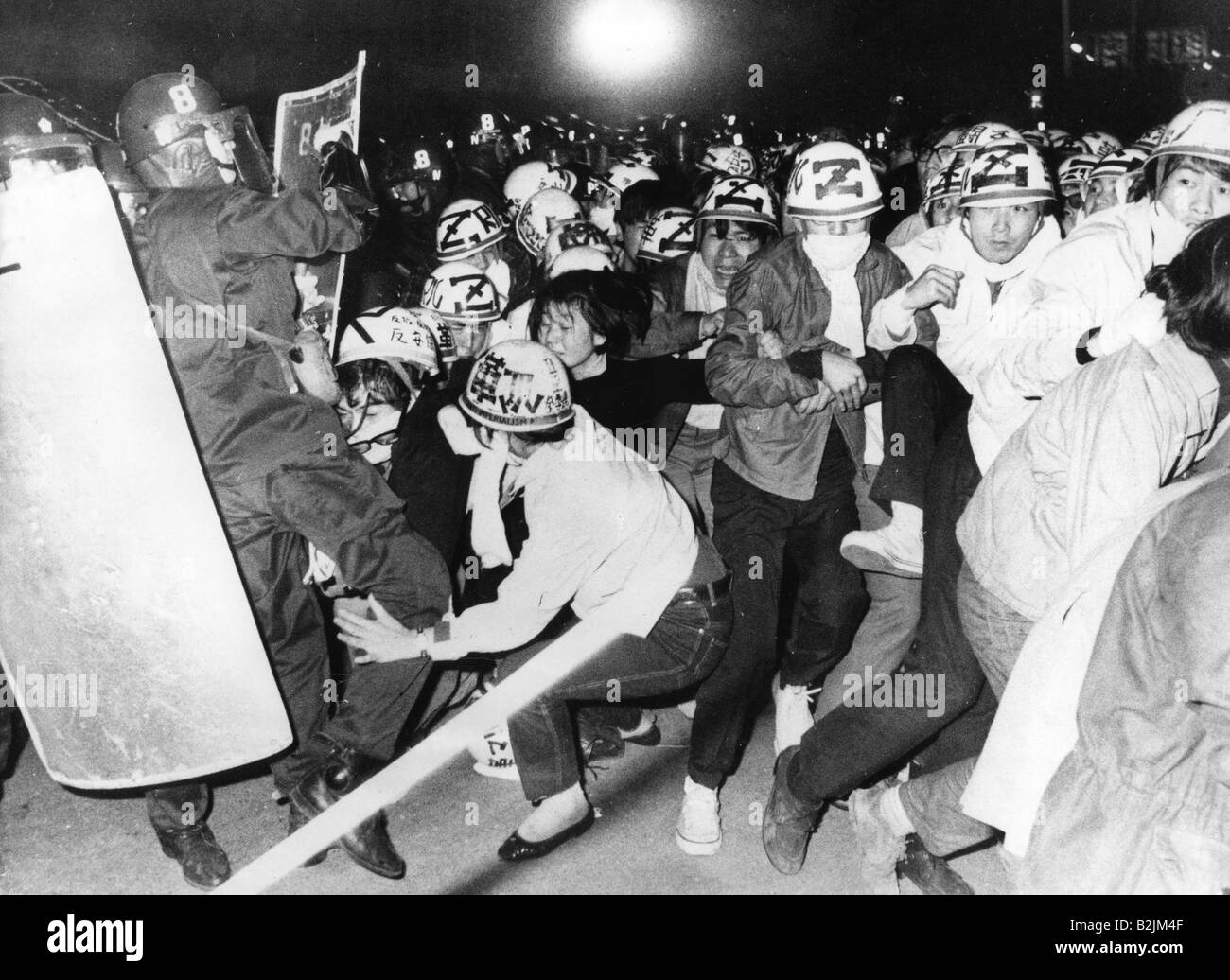 geography / travel, Japan, politics, demonstration at Anti War Day, demonstrators and policemen, Tokyo, 27.3.1970, Stock Photo
