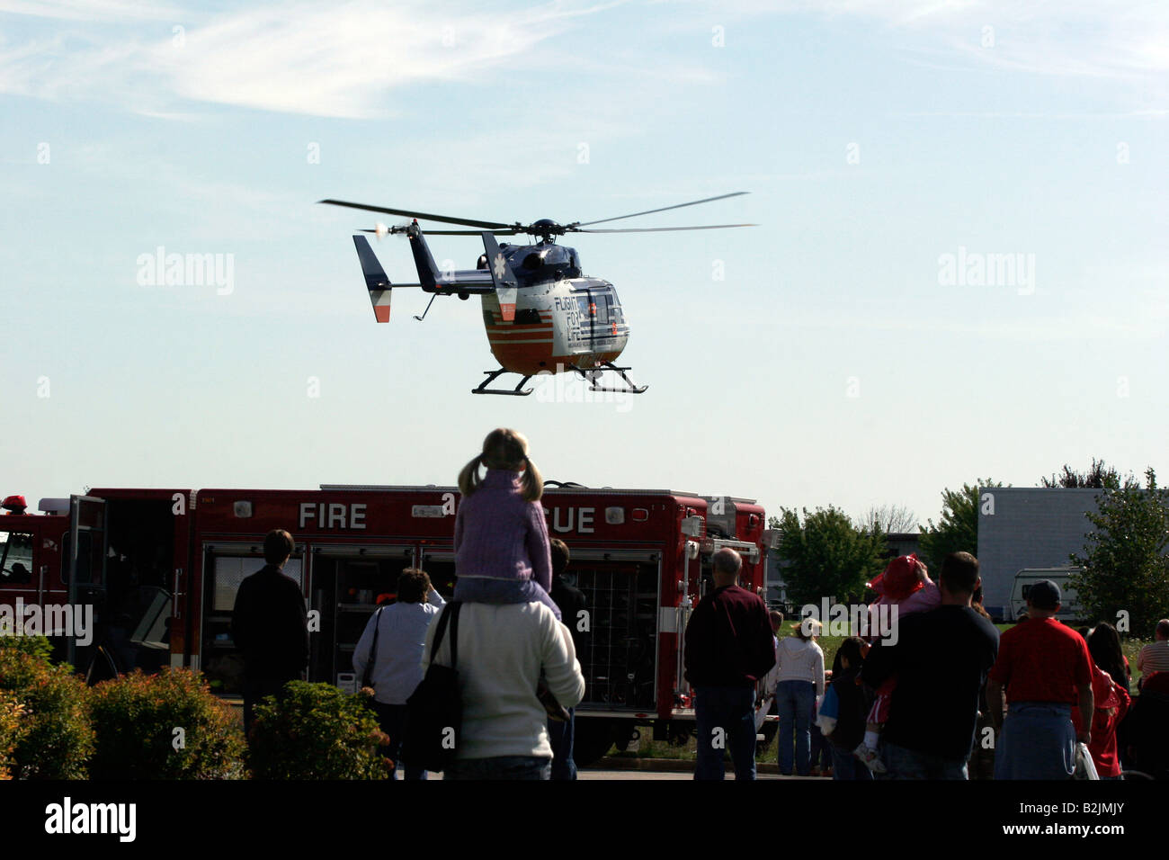 Flight for Life helicopter flying away from a Fire Safety Fair Stock Photo