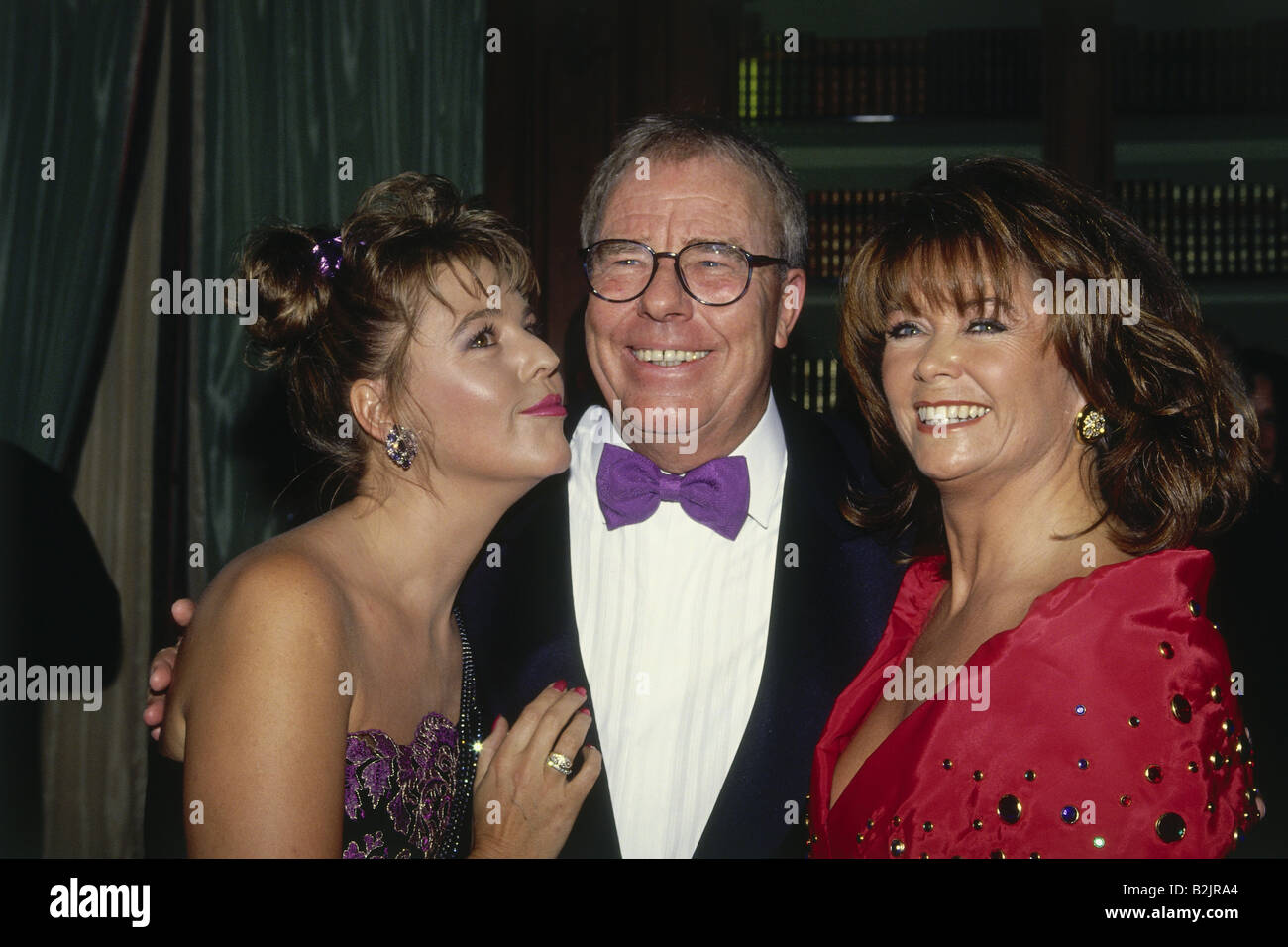 Bruhn, Christian, * 17.10.1934, German composer, half length, with his wife Erica Goetz and Wencke Myhre, at his 60th birthday party, Munich, 1994, Stock Photo