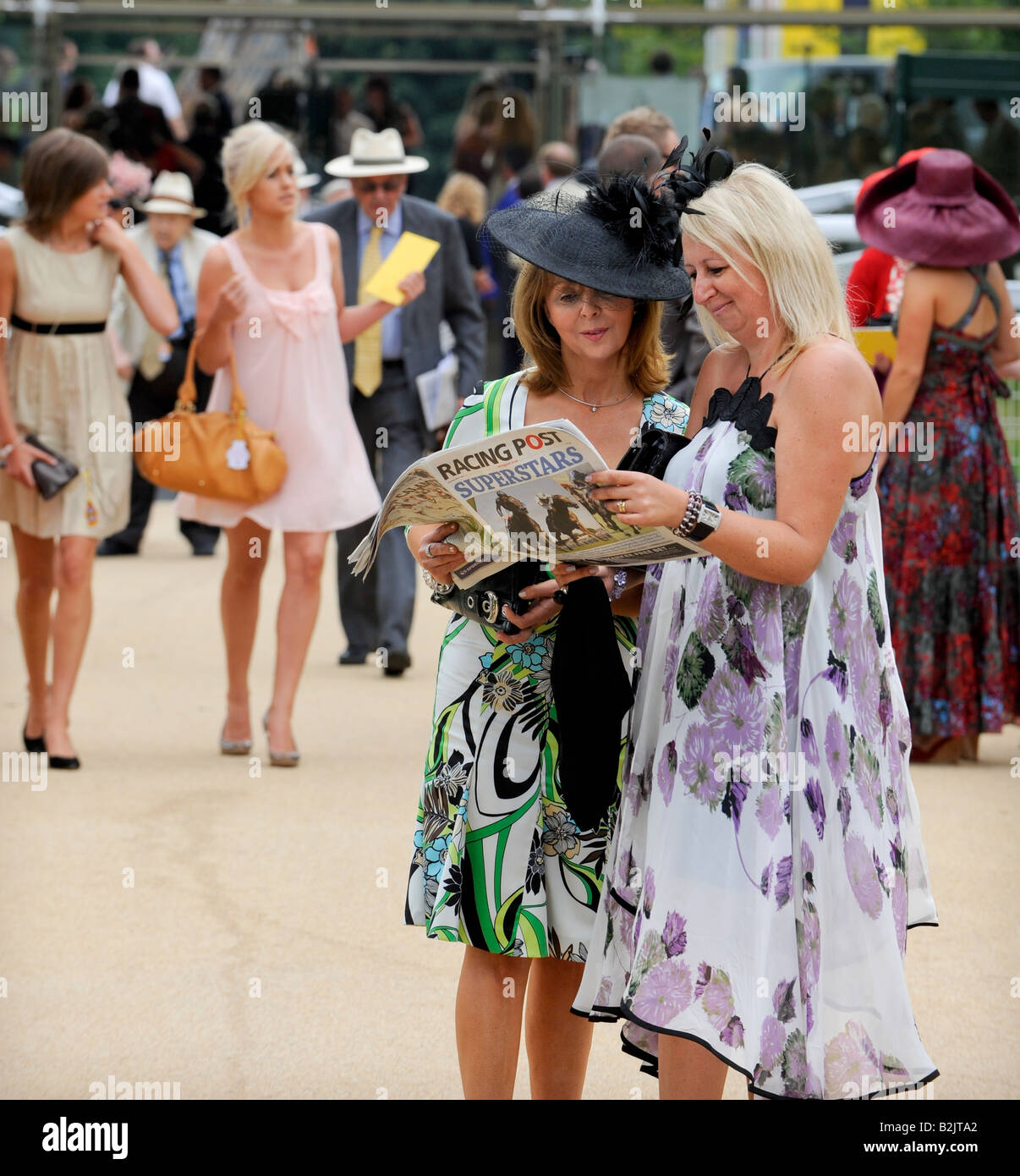 Glorious Goodwood: crowds pack the stands on the popular ladies day. Stock Photo