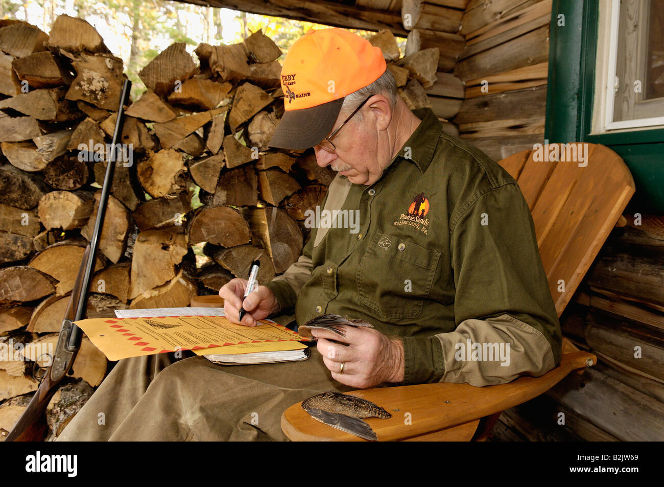 Upland Bird Hunter Recording Information for the US Fish and Wildlife Service Woodcock Wing Study Maine Stock Photo