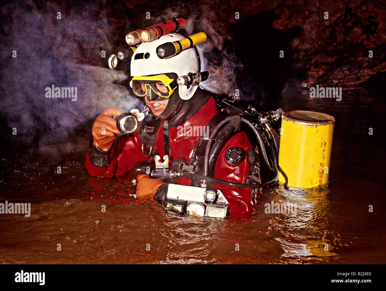 Cave diver with equipment preparing to dive Forest of Dean UK Stock