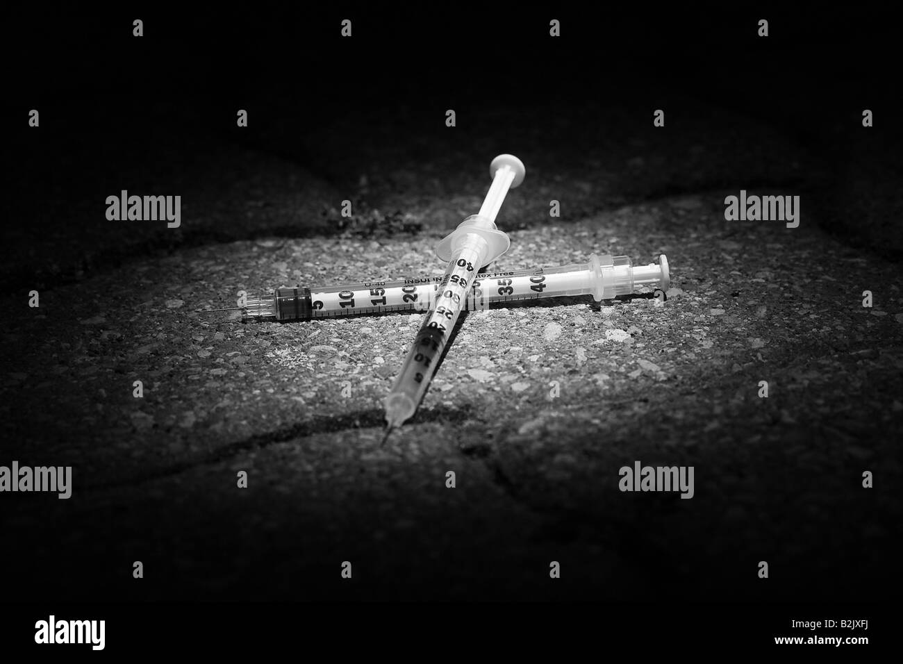 two needles shot at night Stock Photo Alamy
