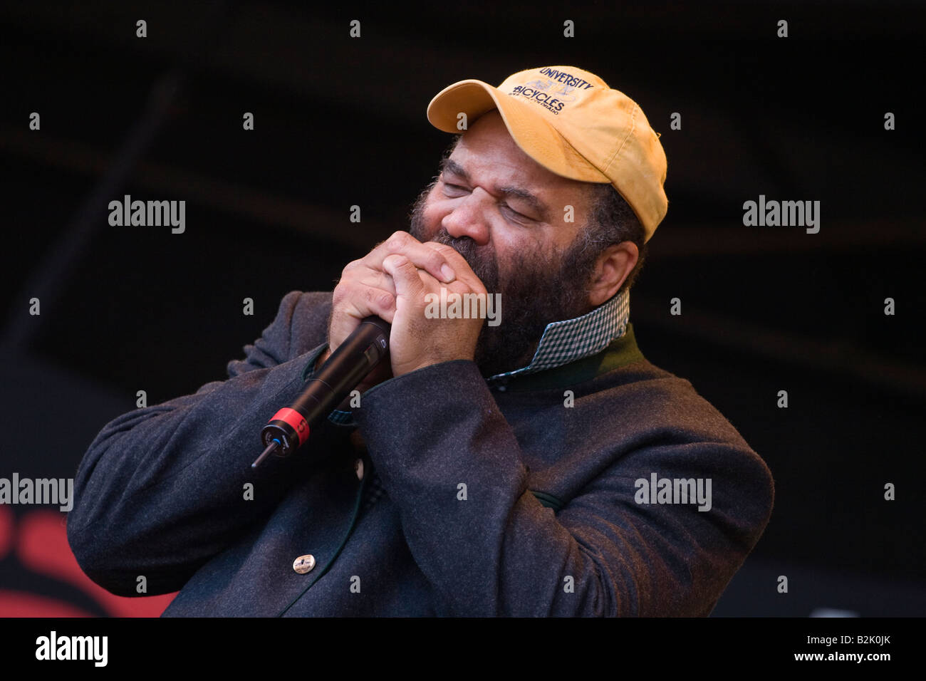 OTIS TAYLOR plays harmonica with his OTIS TAYLOR BAND during the 50th
