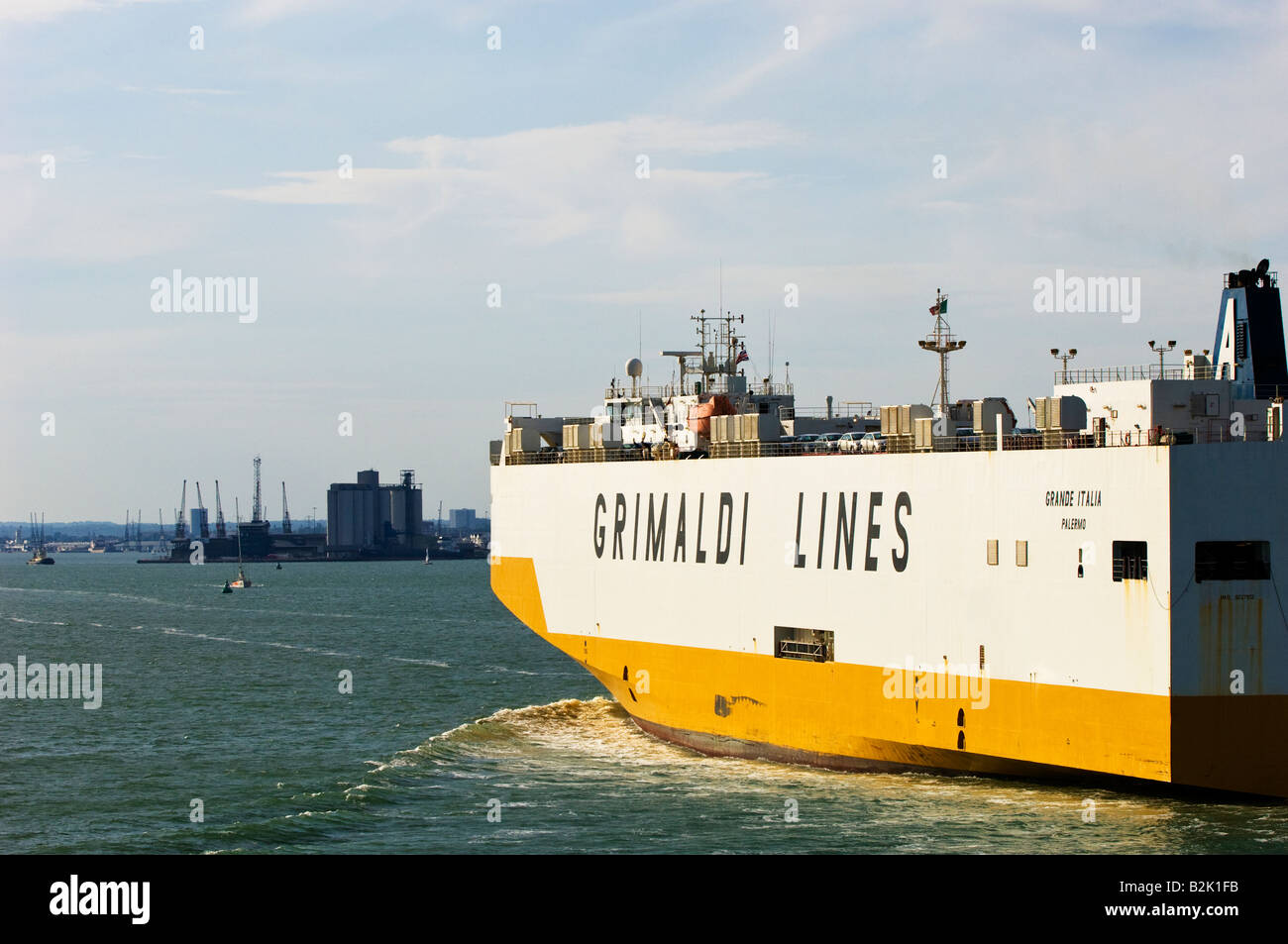 Commercial cargo ship arriving to Southampton United Kingdom Stock Photo