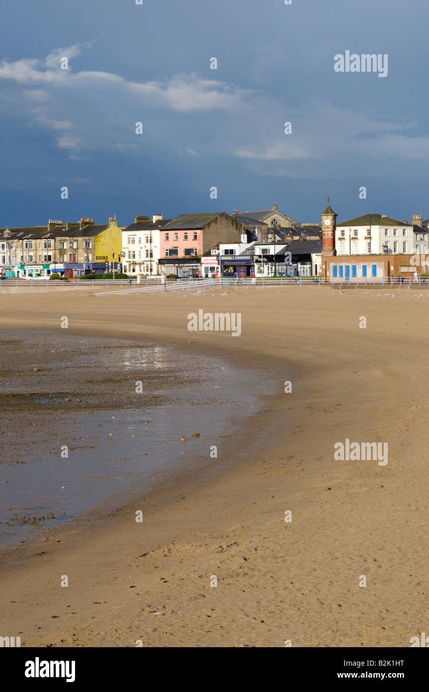 Morecambe seafront and beach with passing storm clouds Stock Photo