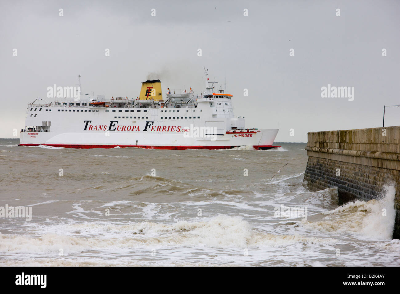 Large ferry in stormy seas coming into the harbour at Ramsgate Kent Stock Photo