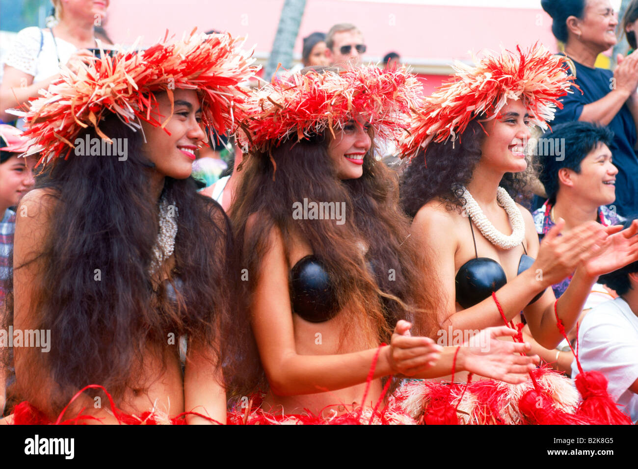 Cook Islanders in colorful dance costumes for Tiare Festival on Aitutaki Island in South Pacific Stock Photo