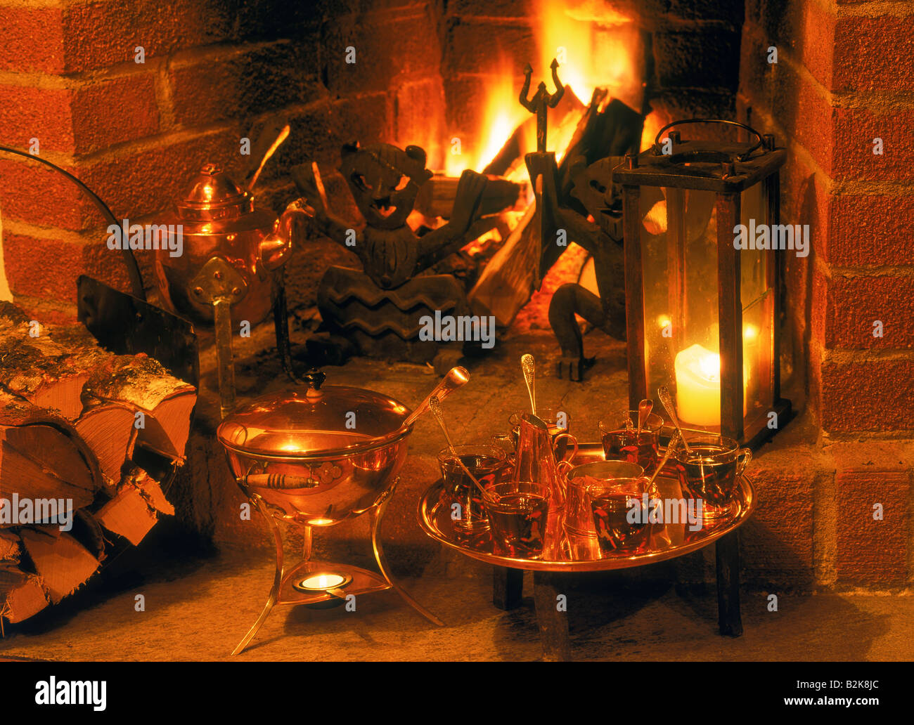 Warm fireplace and warm glögg for cold winter nights in Sweden Stock