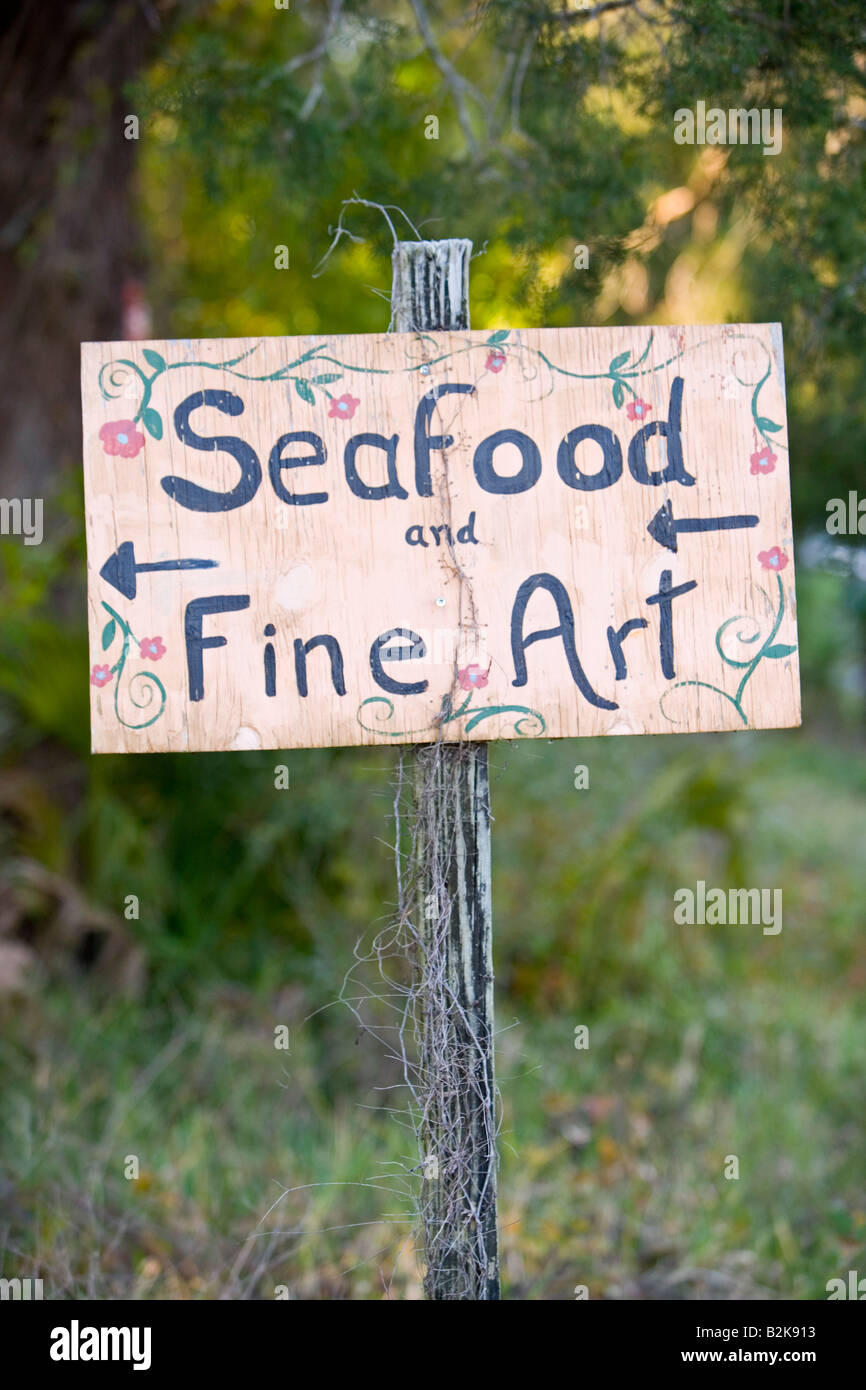 Seafood and Fine Art sign, Cedar Key, Florida Stock Photo Alamy
