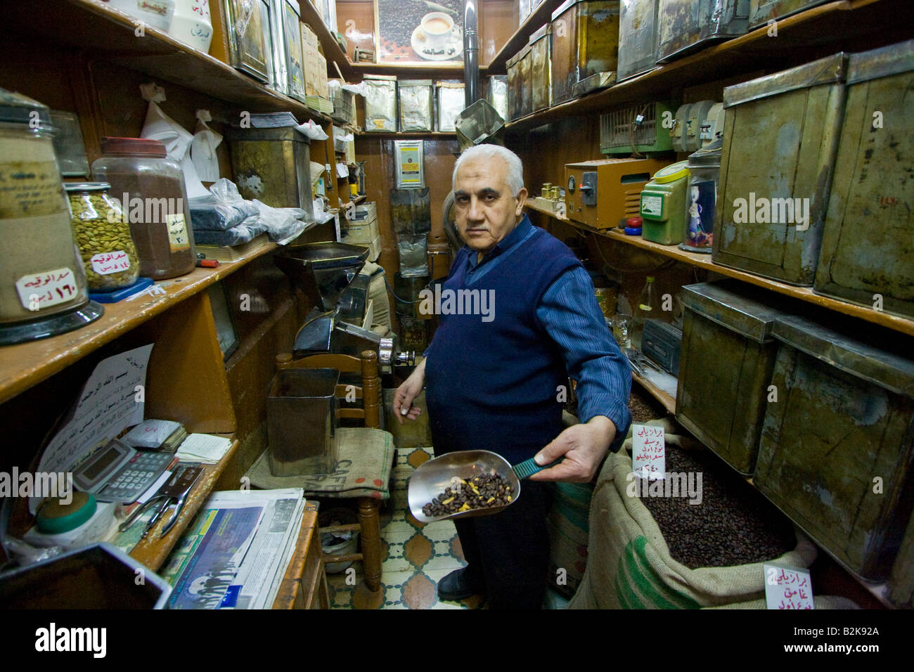 Vendor Selling Coffee Beans and Other Dry Goods in the Souk in the Old City in Damascus Syria