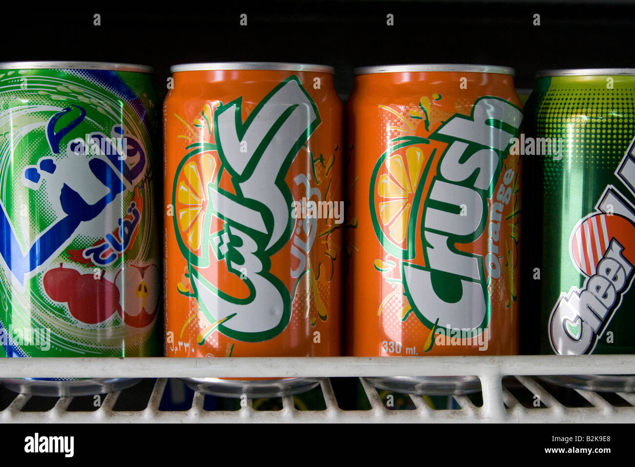Orange Crush Cans in Arabic and English in a Refridgerator in Damascus Syria Stock Photo
