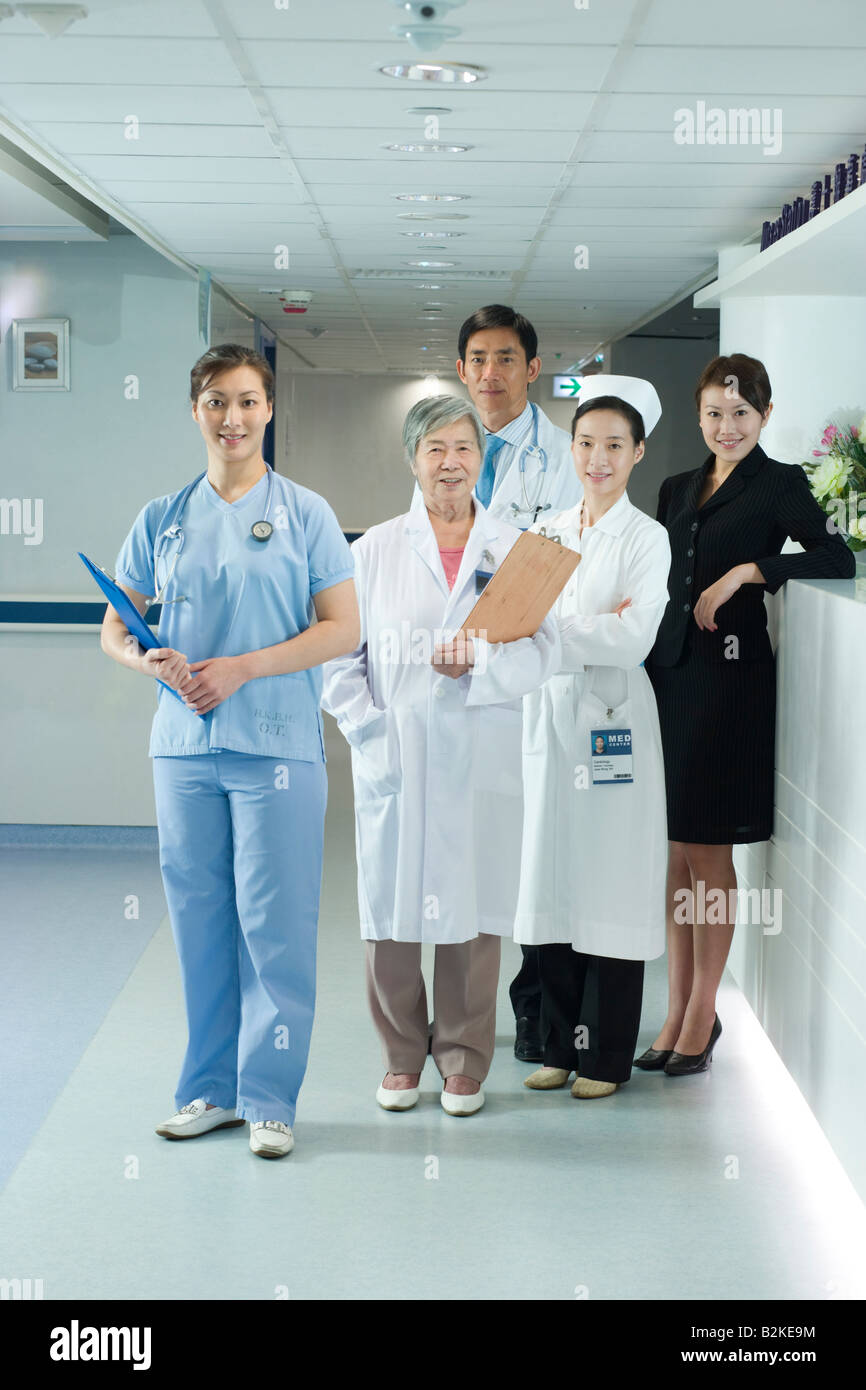 Portrait of medical staff standing in a corridor Stock Photo - Alamy