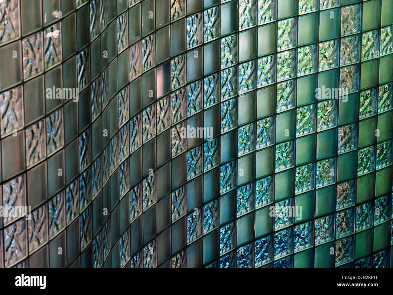 CURVED BLOCK GLASS WALL IN THE SUBWAY STATION OF O'HARE AIRPORT