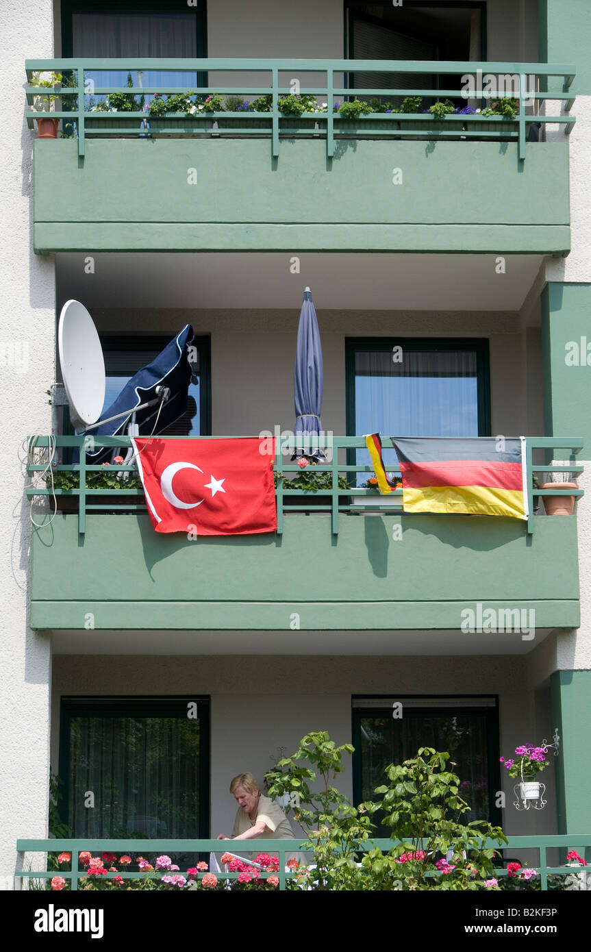 The Turkish and German flags hanged in a residential building during Euro football match in Tiergarten quarter Berlin Germany Stock Photo